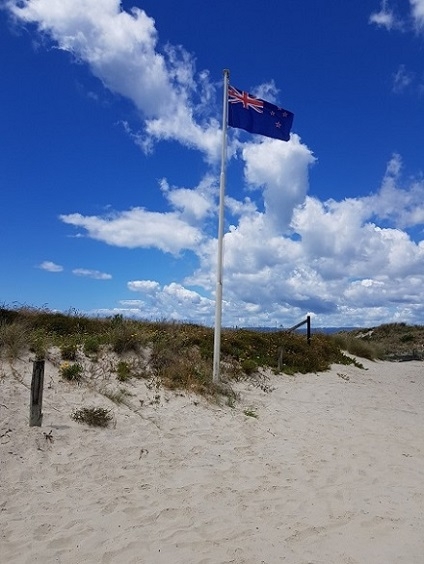 New Zealand beach and flag